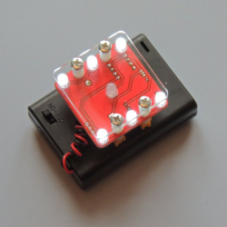 Elektronická hrací kostka s vibrací červené či bílé LED